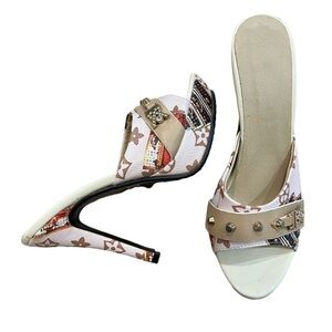 Monogram high heel slides